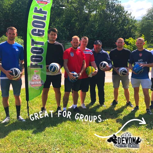 A group of players posing with their footballs at Exeter Football Golf